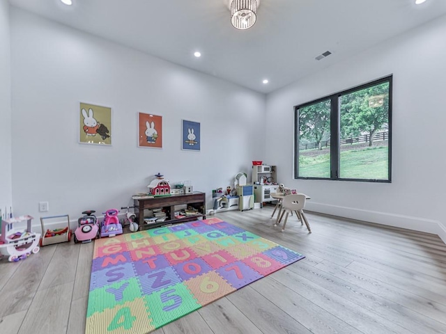 106 Belmont Dr, Canton, GA 30115 - recreation room featuring wood finished floors and recessed lighting