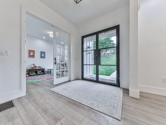 106 Belmont Dr, Canton, GA 30115 - doorway to outside featuring french doors and light wood finished floors