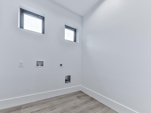 106 Belmont Dr, Canton, GA 30115 - laundry area with hookup for an electric dryer, hookup for a washing machine, and light wood-type flooring