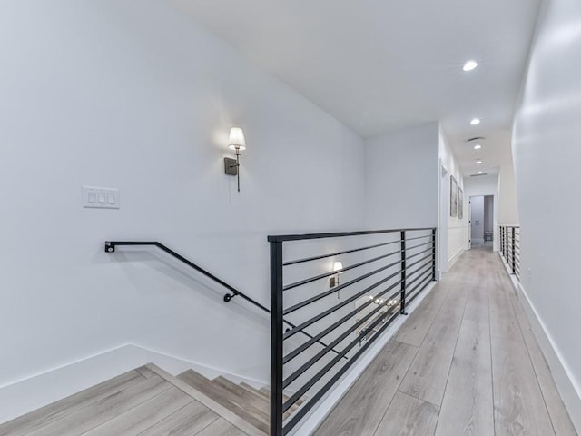 106 Belmont Dr, Canton, GA 30115 - hallway with an upstairs landing, light wood-type flooring, and recessed lighting