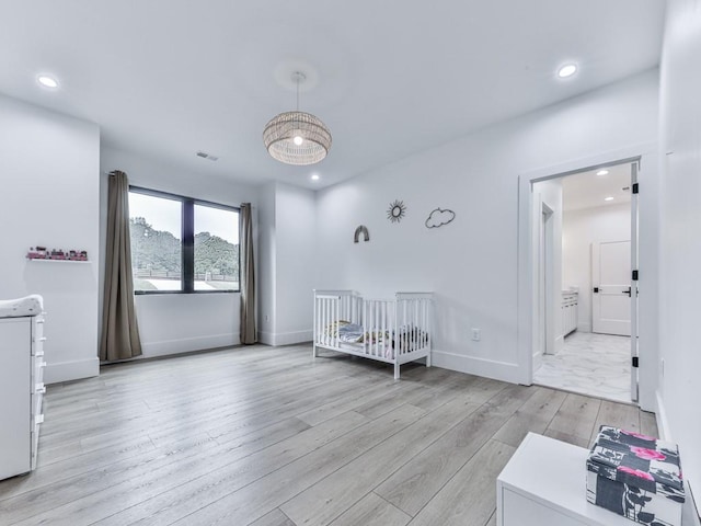 106 Belmont Dr, Canton, GA 30115 - bedroom with light wood finished floors and recessed lighting