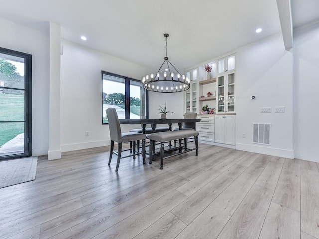 106 Belmont Dr, Canton, GA 30115 - dining space with healthy amount of natural light, a chandelier, light wood-style flooring, and recessed lighting