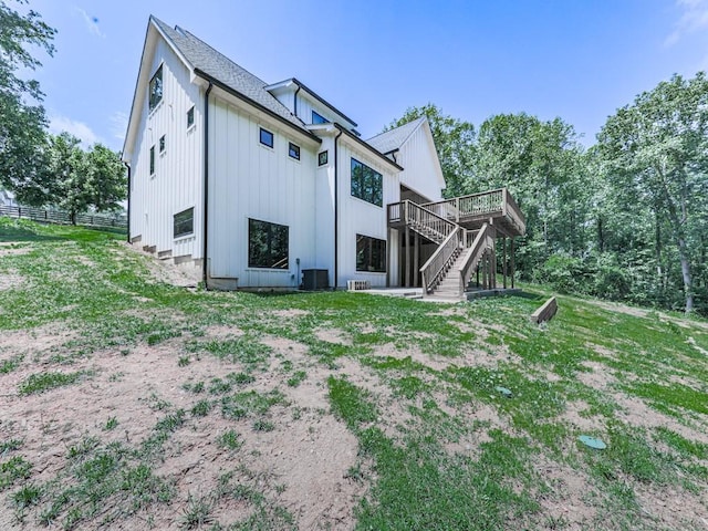 106 Belmont Dr, Canton, GA 30115 - rear view of property with stairway, a wooden deck, and board and batten siding