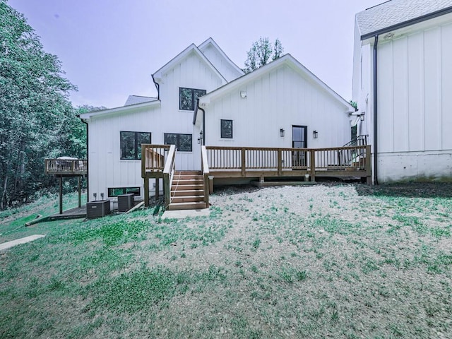 106 Belmont Dr, Canton, GA 30115 - rear view of property featuring board and batten siding and a deck