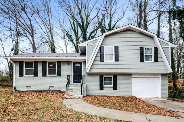 split level home with a garage