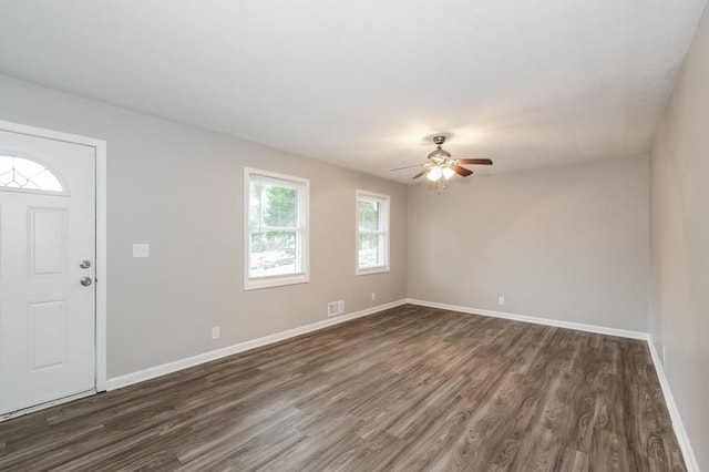 entrance foyer with dark hardwood / wood-style floors and ceiling fan