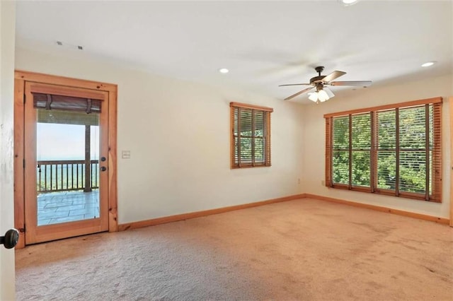 929 Hickory Nut Mountain Rd, Tallulah Falls, GA 30573 - empty room with plenty of natural light, carpet, ceiling fan, and recessed lighting
