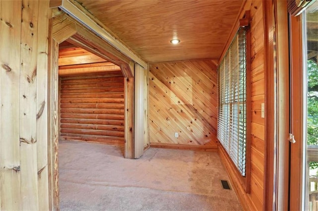 929 Hickory Nut Mountain Rd, Tallulah Falls, GA 30573 - hall with carpet flooring, wood ceiling, and wood walls