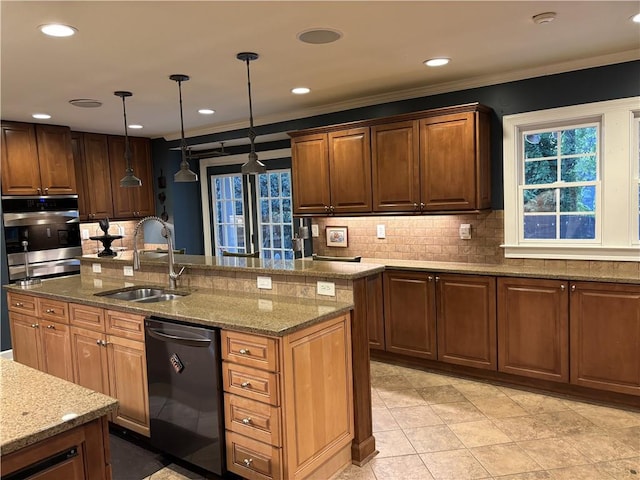 kitchen featuring dishwashing machine, a sink, tasteful backsplash, ornamental molding, and a center island with sink