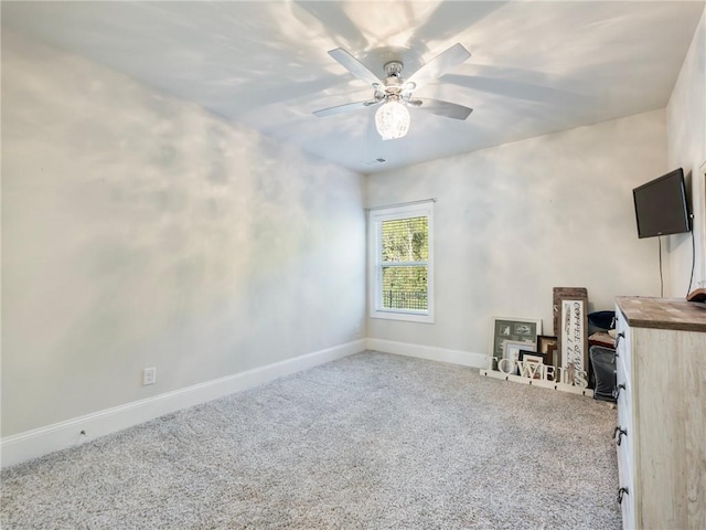 interior space featuring ceiling fan