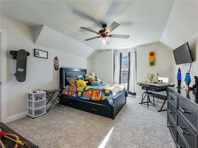 bedroom featuring lofted ceiling, carpet flooring, and ceiling fan