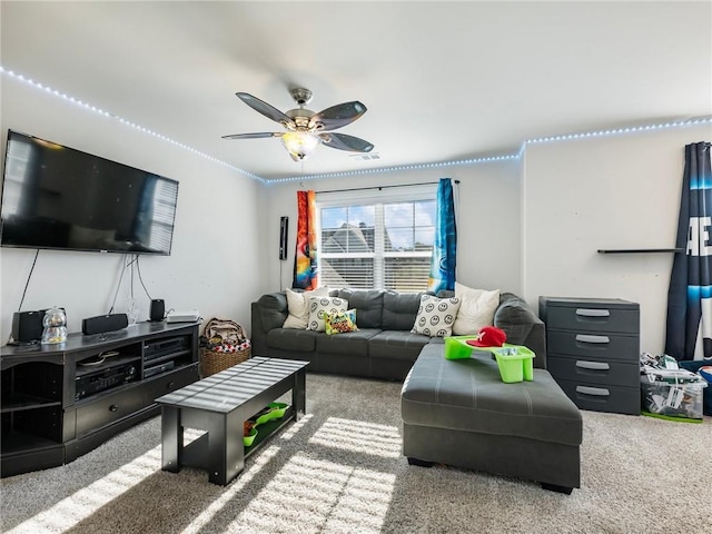 living room featuring carpet flooring and ceiling fan