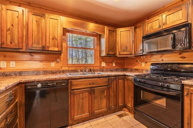 342 Zenith Trl, Ellijay, GA 30540 - kitchen with a sink, brown cabinetry, black appliances, and light tile patterned flooring