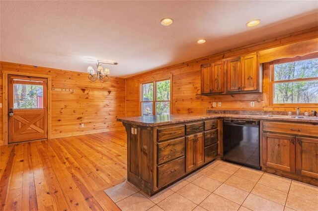 342 Zenith Trl, Ellijay, GA 30540 - kitchen with brown cabinetry, a peninsula, dishwasher, and a sink