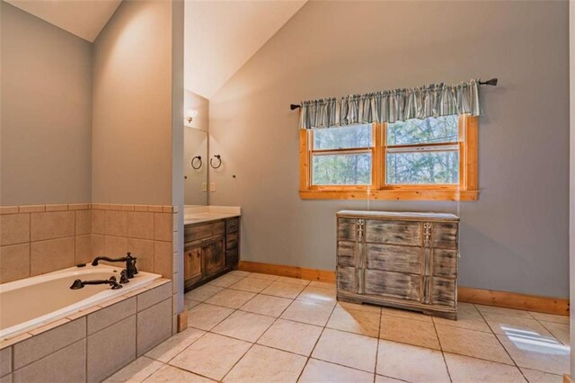 342 Zenith Trl, Ellijay, GA 30540 - full bathroom with a garden tub, vanity, baseboards, and vaulted ceiling