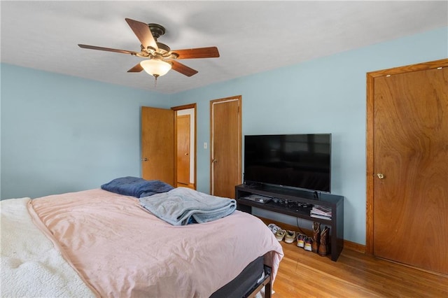 2720 Birchwood Way SW, Marietta, GA 30060 - bedroom featuring light wood-style floors, ceiling fan, and baseboards