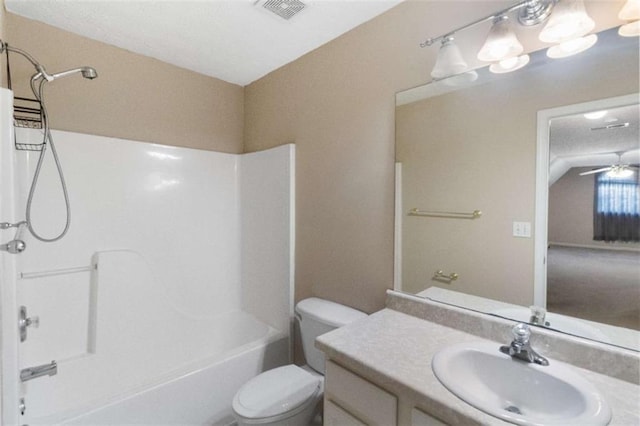 full bathroom with vanity, toilet, ceiling fan, and tub / shower combination