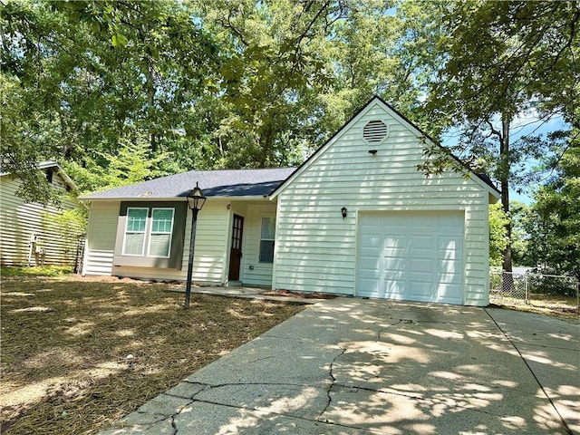 850 Greenhedge Dr, Stone Mountain, GA 30088 - single story home with driveway, a garage, and a shingled roof