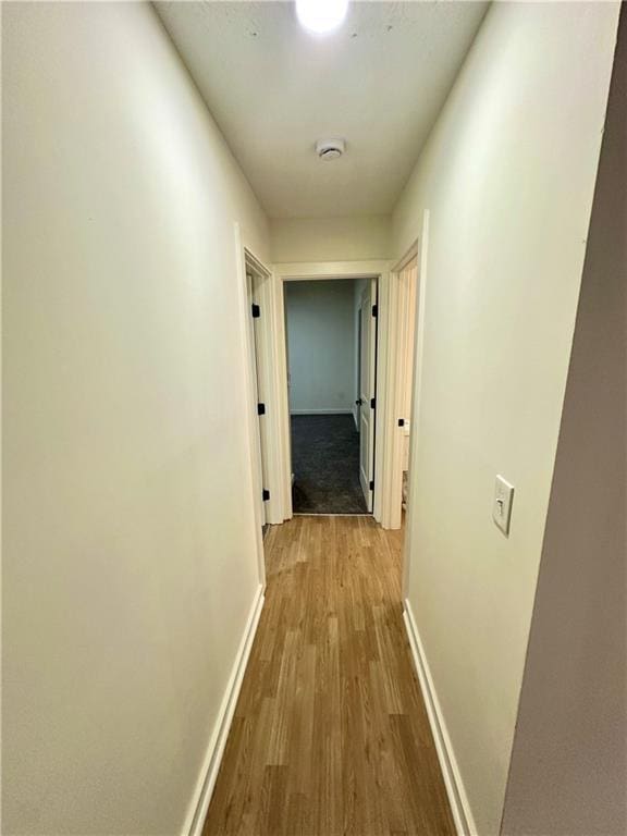 850 Greenhedge Dr, Stone Mountain, GA 30088 - corridor featuring wood finished floors and baseboards