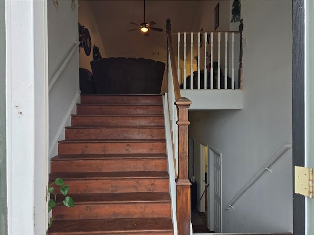 stairs with ceiling fan