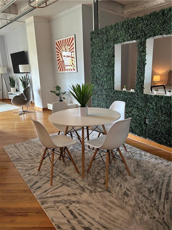 dining room featuring wood-type flooring