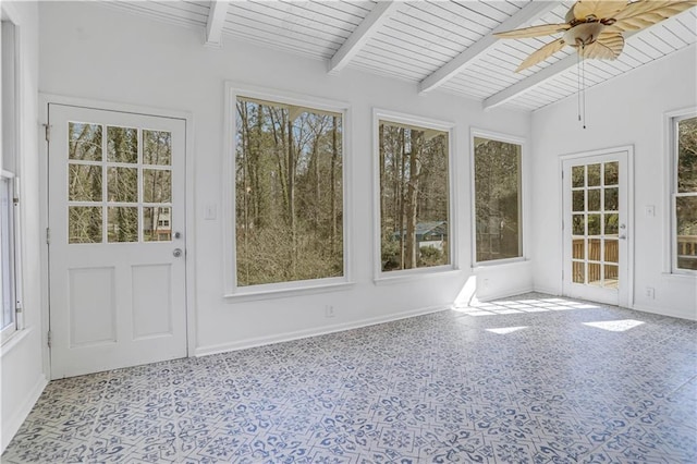 unfurnished sunroom featuring wooden ceiling, lofted ceiling with beams, and ceiling fan