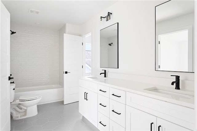 full bath featuring visible vents, a sink, tile patterned flooring, and toilet