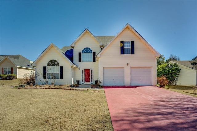 traditional home featuring a garage, a front lawn, and concrete driveway