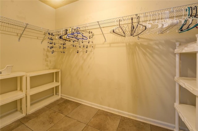 walk in closet featuring tile patterned floors