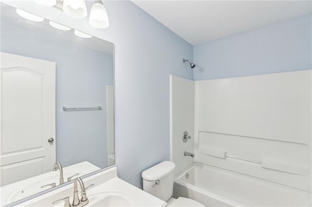 full bathroom with vanity, toilet, and shower / tub combination