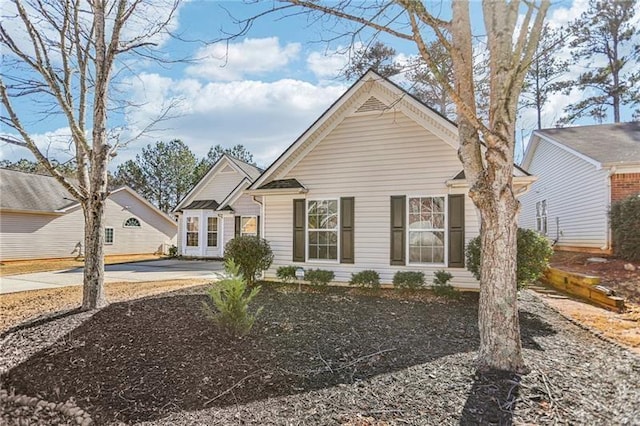 view of front of home featuring concrete driveway