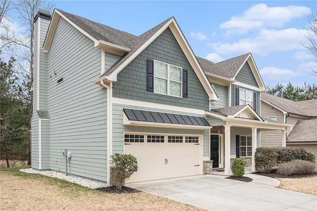 craftsman-style house with roof with shingles, covered porch, an attached garage, a standing seam roof, and driveway