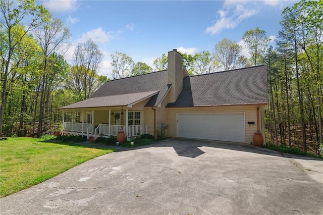 86 Sleepy Hollow Rd, Dahlonega, GA 30533 - view of front of home with covered porch, driveway, a front lawn, a garage, and a chimney