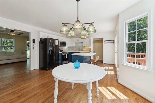86 Sleepy Hollow Rd, Dahlonega, GA 30533 - dining area featuring wood finished floors and a ceiling fan