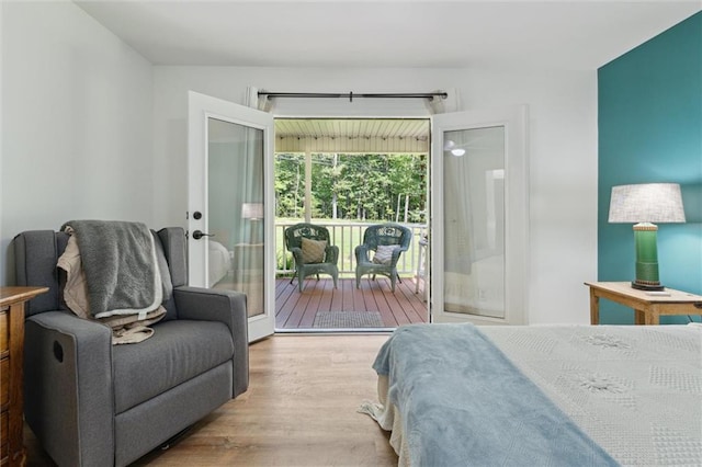 86 Sleepy Hollow Rd, Dahlonega, GA 30533 - bedroom featuring access to exterior, wood finished floors, and french doors