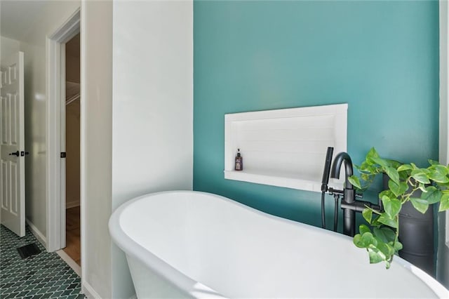 86 Sleepy Hollow Rd, Dahlonega, GA 30533 - full bathroom with a freestanding bath and a walk in closet