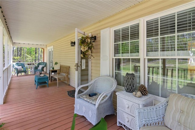 86 Sleepy Hollow Rd, Dahlonega, GA 30533 - wooden porch with an outdoor hangout area