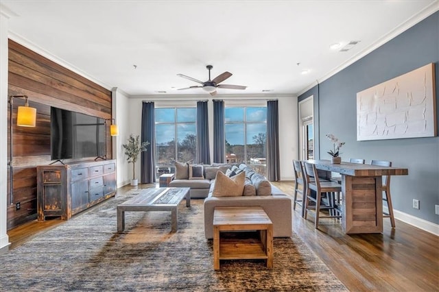360 Chambers St Unit 301, Woodstock, GA 30188 - living room featuring crown molding, baseboards, a ceiling fan, and wood finished floors