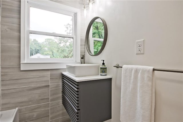 bathroom featuring vanity and plenty of natural light