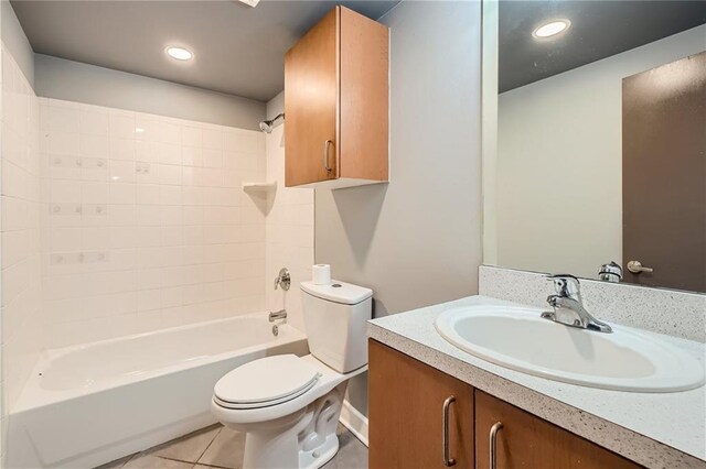 3046 Briarcliff Rd NE Unit 15, Atlanta, GA 30329 - bathroom with toilet, shower / washtub combination, vanity, tile patterned flooring, and recessed lighting