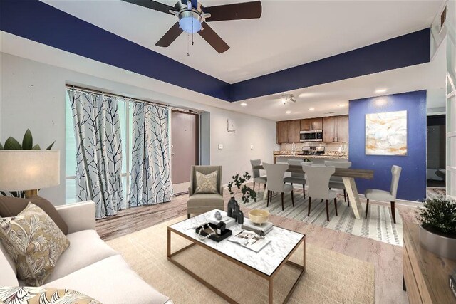 3046 Briarcliff Rd NE Unit 15, Atlanta, GA 30329 - living area featuring light wood-style floors, ceiling fan, recessed lighting, and baseboards