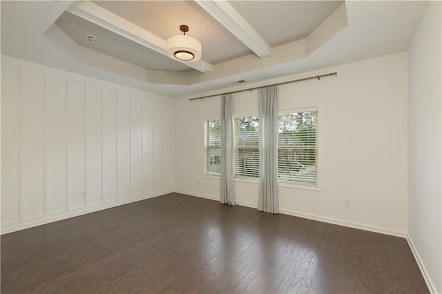 1962 Bainbridge Ln, Chamblee, GA 30345 - spare room with dark wood-style floors and beam ceiling