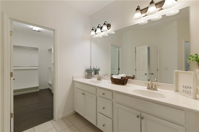 1962 Bainbridge Ln, Chamblee, GA 30345 - full bath featuring double vanity, tile patterned floors, and a closet