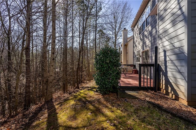 view of yard with a deck