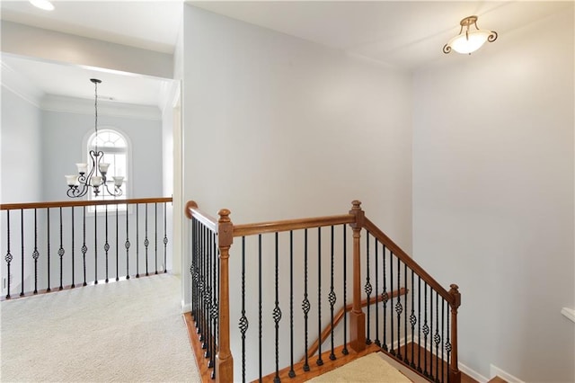 4652 Prater Way SE, Smyrna, GA 30080 - stairs featuring a chandelier, crown molding, and carpet floors