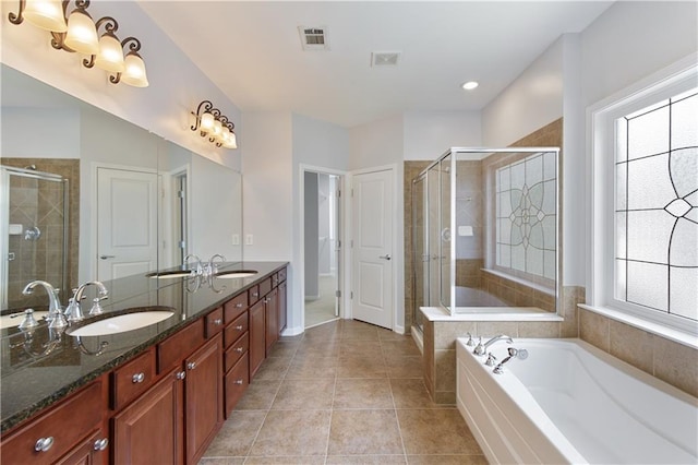 4652 Prater Way SE, Smyrna, GA 30080 - full bathroom with a bath, double vanity, a stall shower, and tile patterned flooring