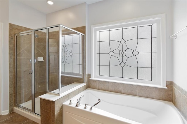 4652 Prater Way SE, Smyrna, GA 30080 - bathroom featuring a garden tub, a shower stall, and tile patterned flooring