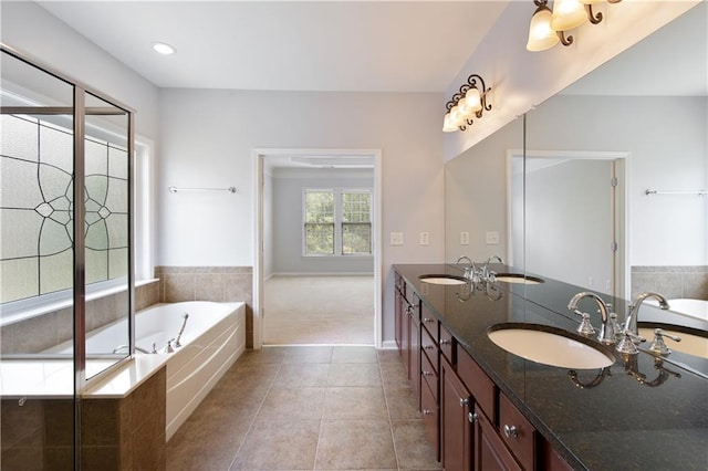 4652 Prater Way SE, Smyrna, GA 30080 - bathroom featuring a garden tub, double vanity, and tile patterned flooring