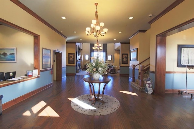 interior space with crown molding, an inviting chandelier, wood finished floors, baseboards, and stairway