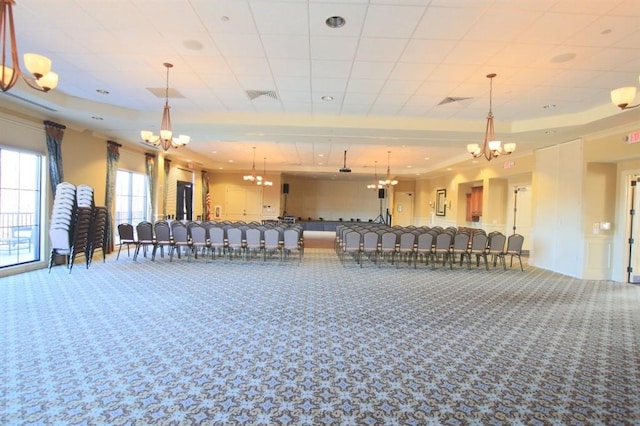 miscellaneous room featuring carpet flooring, a notable chandelier, and visible vents